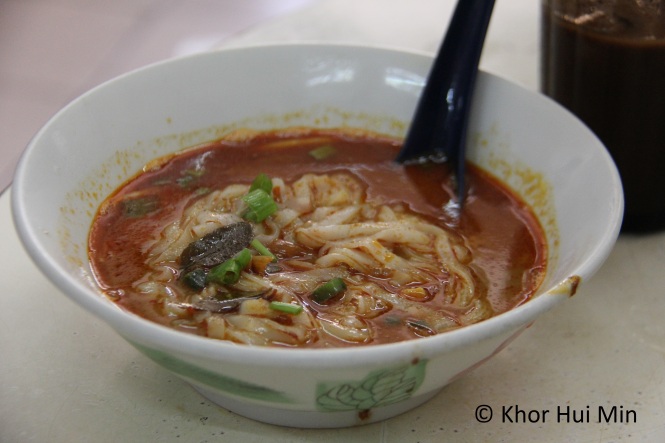 Curry noodles featuring flat rice noodles at Xin Quan Fang, Ipoh